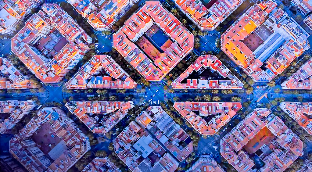 Barcelona's Eixample district from above, square city blocks on an even street grid